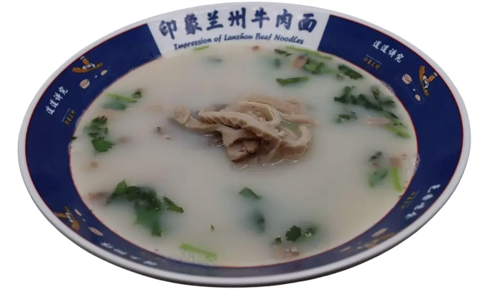 Creamy lamb offal soup with cilantro at Impression of Lanzhou, a Chinese Restaurant in Berkeley.